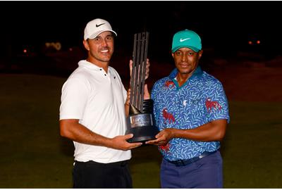 Brooks Koepka, winner of the LIV Golf Invitational Jeddah, with Majed Al Sorour, CEO of Saudi Golf Federation.