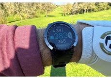 The Shot Scope X5 watch on the golf course.