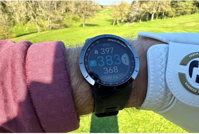 The Shot Scope X5 watch on the golf course.