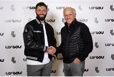 Jon Rahm shakes hands with LIV Golf CEO Greg Norman after agreeing to join the Saudi-backed tour and become the world's highest-paid athlete.