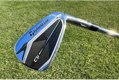 A close up of the cap back design of the TaylorMade Qi iron