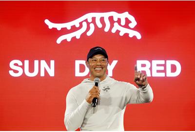 Tiger Woods unveils his new Sun Day Red clothing and footwear line.