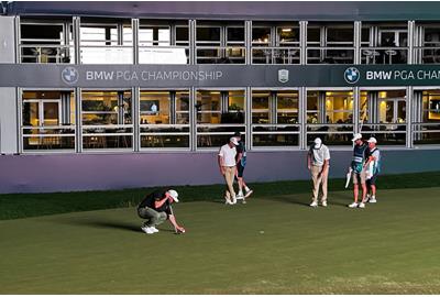 Andrew 'Beef' Johnston lines up his putt on the 18th hole at the BMW PGA Championship