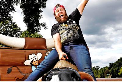 Andrew Beef Johnston rides a bull for TG