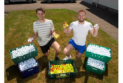 Campbell Mathieson and Andrew Bogle recycle golf balls and sell them for charity.